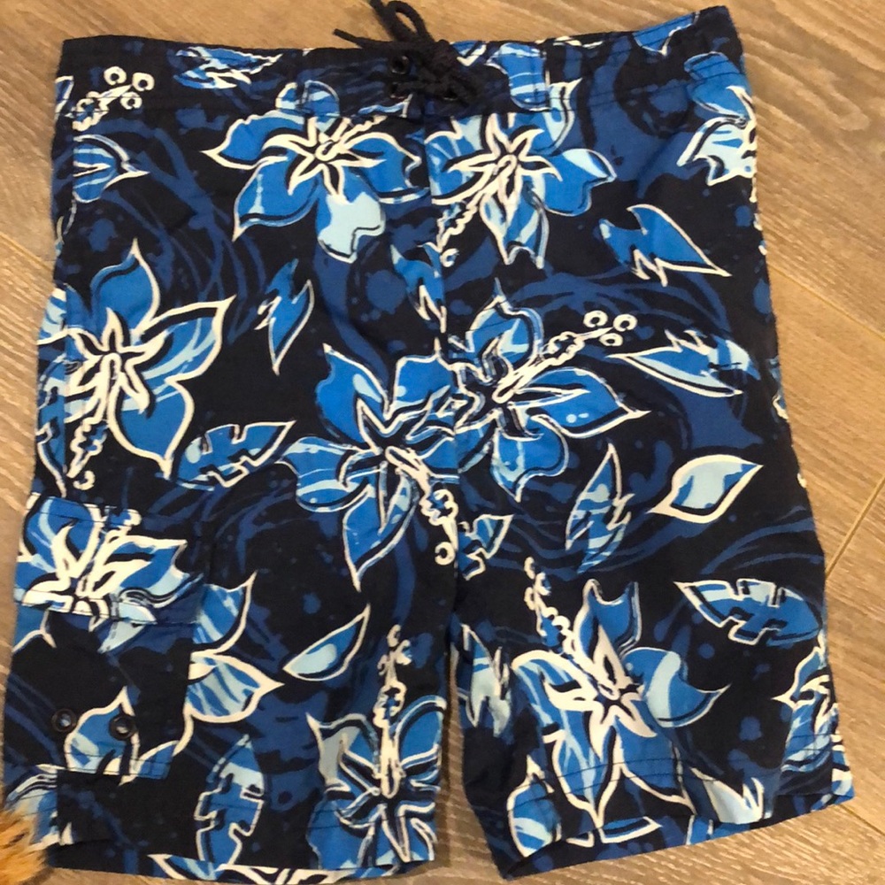 Boys swim trunks, Hawaiian pattern with flowers.